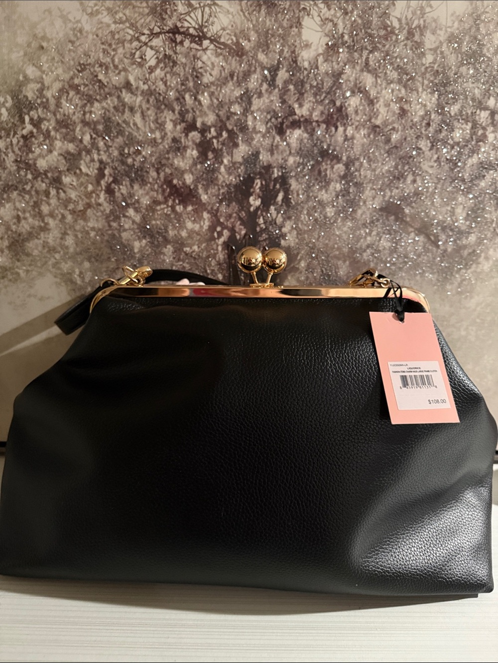 Juicy Couture kisslock handbag w/a prominent blush pink bow and pearl charm.$108 - Picture 6 of 10